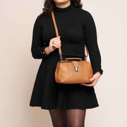 
Styled Fit Perspective of Rachael Full-Grain Leather Handbag on Model - Natural Daylight Drape