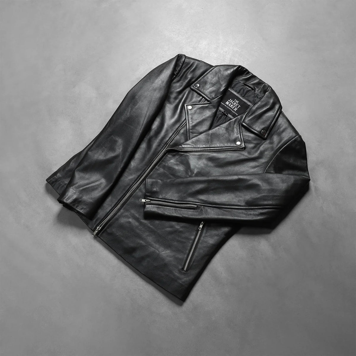 
Zipper & Hem Craftsmanship Construction Detail on Men's Noah Black Leather Biker Jacket